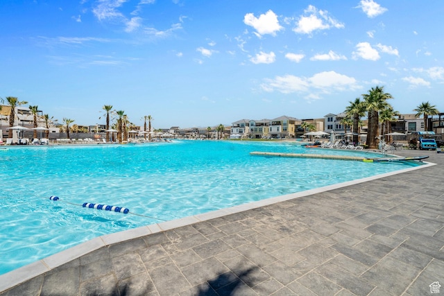 community pool featuring a residential view