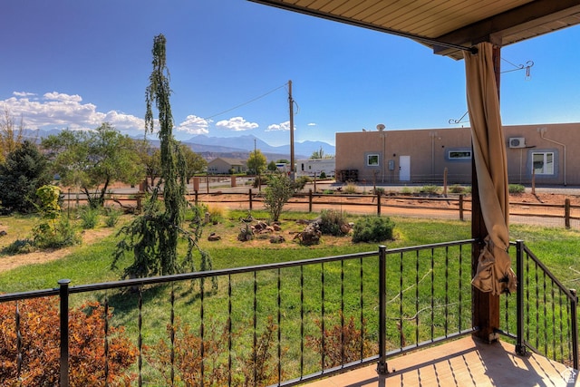 balcony with a mountain view and a rural view