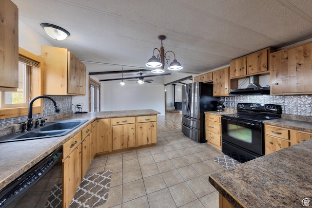 kitchen with a peninsula, exhaust hood, light tile patterned flooring, black appliances, and a sink