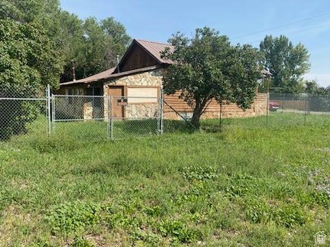 215 W 200 S, Duchesne, UT 84021 - view of yard featuring fence and an attached garage