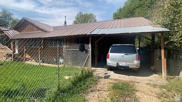 215 W 200 S, Duchesne, UT 84021 - view of front of house featuring a carport, a front yard, and metal roof