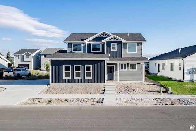 626 W 20 N, Hyrum, UT 84319 - view of front of property with board and batten siding, a residential view, and covered porch