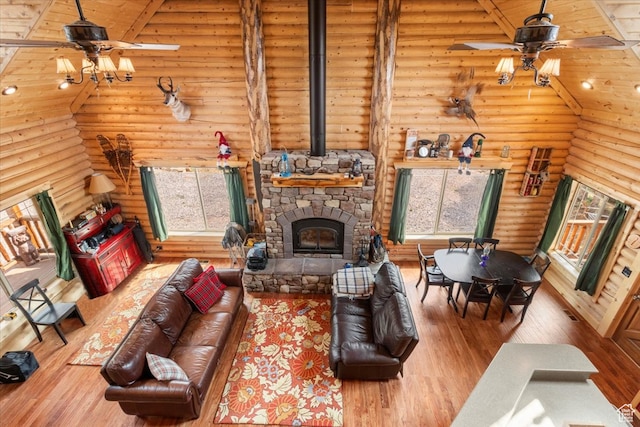 14775 N 12565 E 66&67, Mount Pleasant, UT 84647 - living room featuring a stone fireplace, high vaulted ceiling, and ceiling fan
