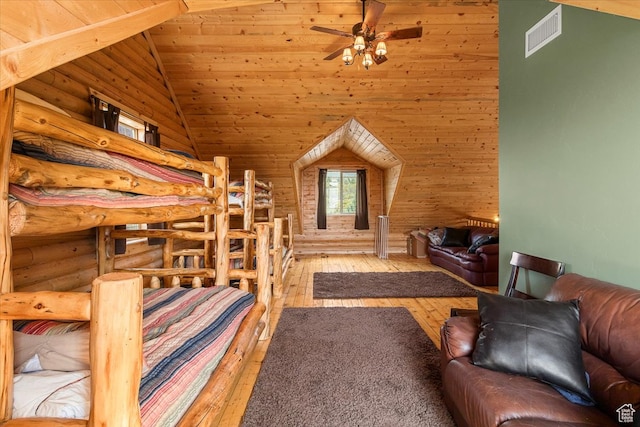 14775 N 12565 E 66&67, Mount Pleasant, UT 84647 - bedroom with visible vents, wood ceiling, vaulted ceiling, log walls, and wood-type flooring