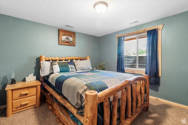 14775 N 12565 E 66&67, Mount Pleasant, UT 84647 - carpeted bedroom with visible vents, a textured ceiling, and baseboards