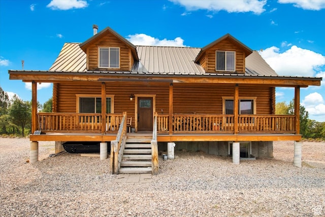 14775 N 12565 E 66&67, Mount Pleasant, UT 84647 - rear view of house featuring covered porch, log exterior, and metal roof