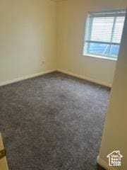 14112 S Senior Band Rd, Draper, UT 84020 - unfurnished room with baseboards and dark carpet