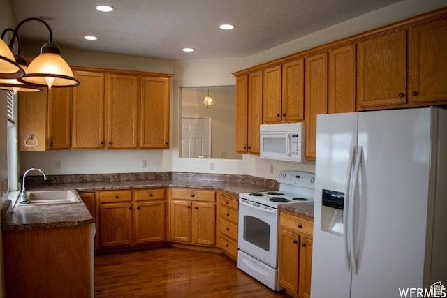 14112 S Senior Band Rd, Draper, UT 84020 - kitchen with a sink, dark countertops, brown cabinets, and white appliances