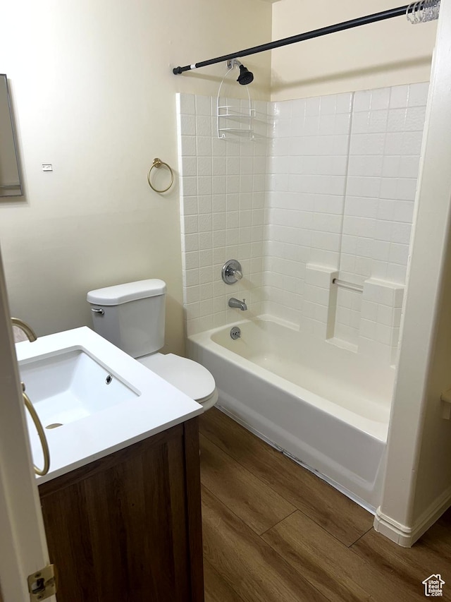 14112 S Senior Band Rd, Draper, UT 84020 - bathroom featuring wood finished floors, toilet, vanity, and shower / bath combination