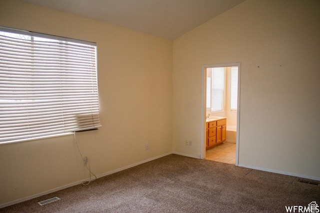 14112 S Senior Band Rd, Draper, UT 84020 - unfurnished room with light carpet, visible vents, plenty of natural light, and lofted ceiling