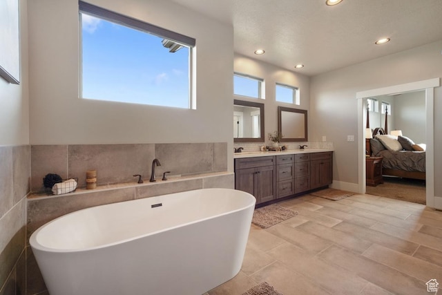 1806 S Summit Haven Dr Unit 1, Francis, UT 84036 - full bathroom with ensuite bathroom, recessed lighting, double vanity, and a freestanding bath