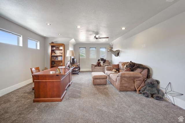 1806 S Summit Haven Dr Unit 1, Francis, UT 84036 - carpeted living area featuring a textured ceiling, a healthy amount of sunlight, and a ceiling fan