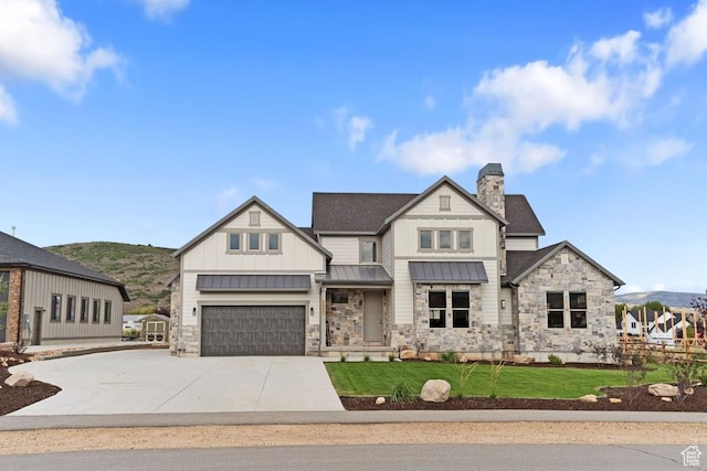 1806 S Summit Haven Dr Unit 1, Francis, UT 84036 - modern farmhouse style home with a front lawn, driveway, stone siding, board and batten siding, and a standing seam roof