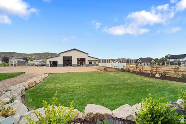1806 S Summit Haven Dr Unit 1, Francis, UT 84036 - view of yard featuring fence, dirt driveway, an outbuilding, and a garage