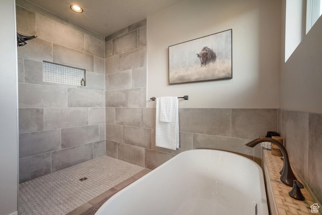 1806 S Summit Haven Dr Unit 1, Francis, UT 84036 - full bath featuring a freestanding tub, recessed lighting, and tiled shower