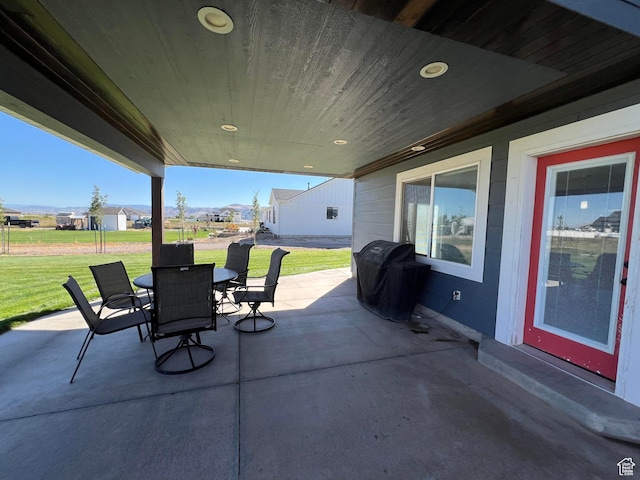 472 W 2300 S Unit 18, Richfield, UT 84701 - view of patio with a grill and outdoor dining area