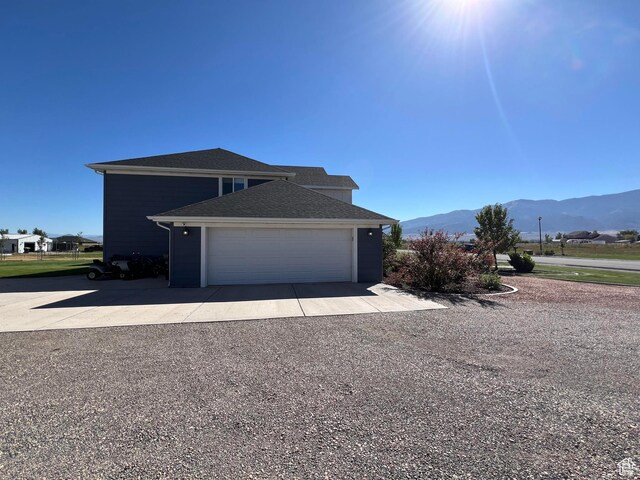 472 W 2300 S Unit 18, Richfield, UT 84701 - view of side of home with a mountain view and an attached garage