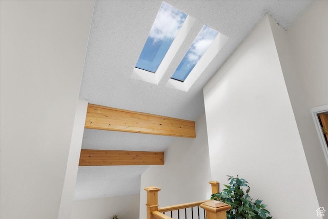 2328 W 300 N, Provo, UT 84601 - stairs with lofted ceiling with skylight and a textured ceiling