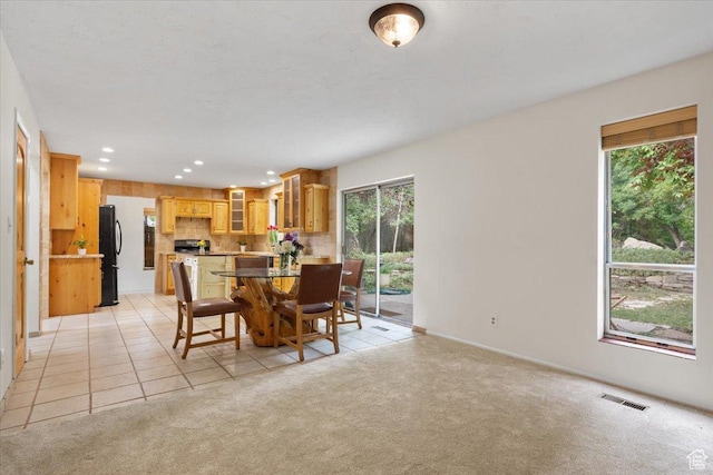 2328 W 300 N, Provo, UT 84601 - dining space featuring recessed lighting, visible vents, light colored carpet, and light tile patterned floors