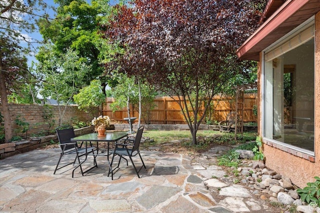 2328 W 300 N, Provo, UT 84601 - view of patio / terrace featuring outdoor dining space and a fenced backyard