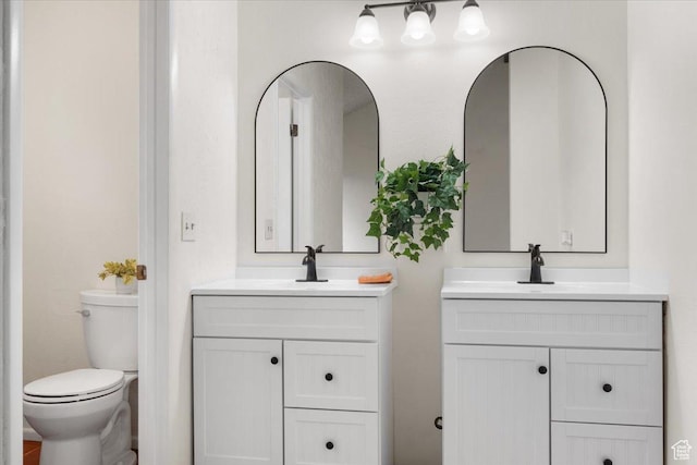 2328 W 300 N, Provo, UT 84601 - bathroom featuring a sink, toilet, and two vanities