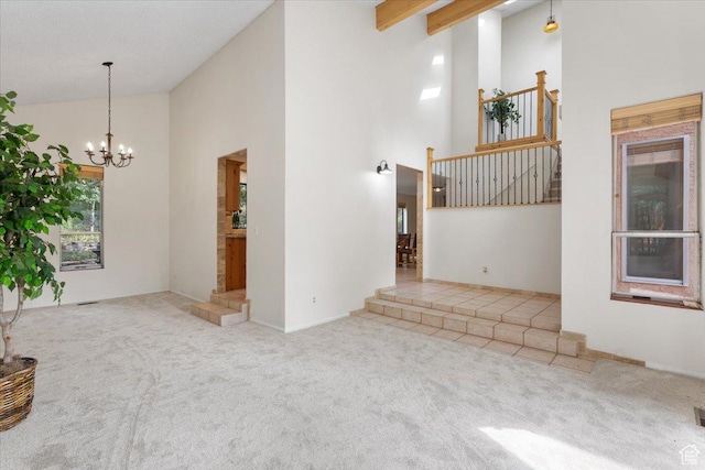 2328 W 300 N, Provo, UT 84601 - unfurnished living room featuring beam ceiling, carpet flooring, high vaulted ceiling, and an inviting chandelier