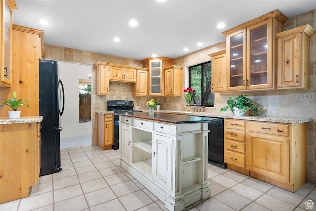 2328 W 300 N, Provo, UT 84601 - kitchen featuring black appliances, open shelves, tasteful backsplash, light tile patterned flooring, and glass insert cabinets