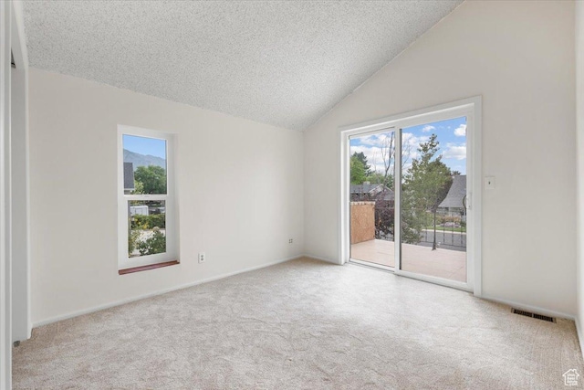 2328 W 300 N, Provo, UT 84601 - carpeted spare room featuring vaulted ceiling, visible vents, and a textured ceiling