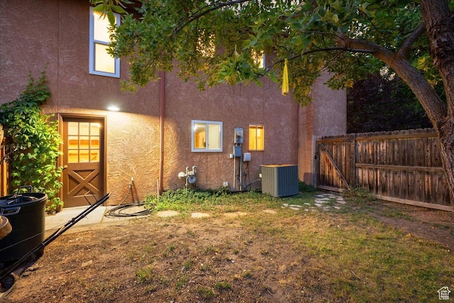 2328 W 300 N, Provo, UT 84601 - rear view of house featuring central air condition unit, fence, and stucco siding