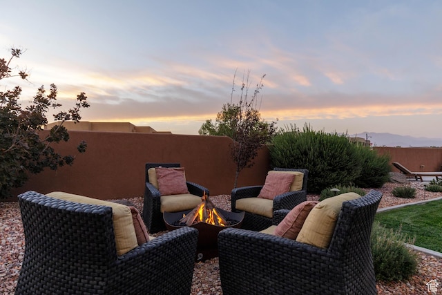 3318 S Red Rock Way, Hurricane, UT 84737 - view of patio featuring an outdoor fire pit and fence