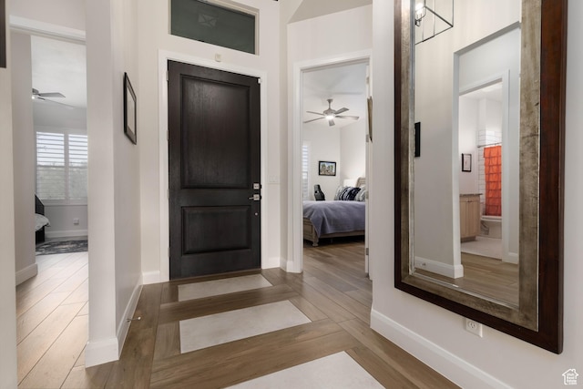 3318 S Red Rock Way, Hurricane, UT 84737 - entrance foyer with baseboards, ceiling fan, and wood finished floors