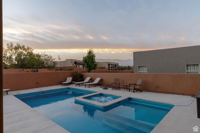 3318 S Red Rock Way, Hurricane, UT 84737 - view of pool with fence, a patio area, and an in ground hot tub