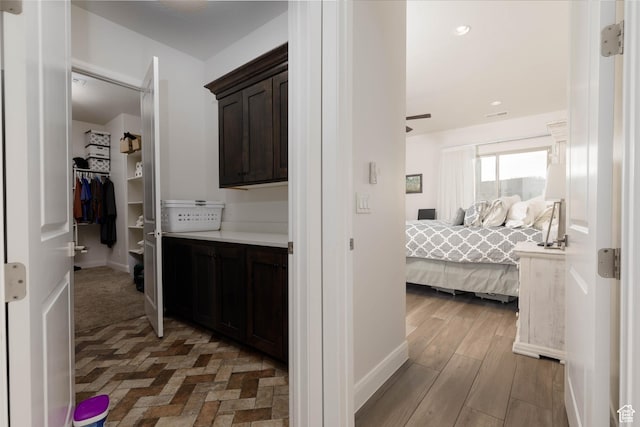 3318 S Red Rock Way, Hurricane, UT 84737 - hallway with baseboards, light wood-type flooring, and recessed lighting