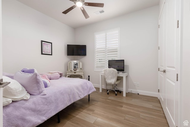 3318 S Red Rock Way, Hurricane, UT 84737 - bedroom featuring baseboards, a ceiling fan, visible vents, and light wood-type flooring