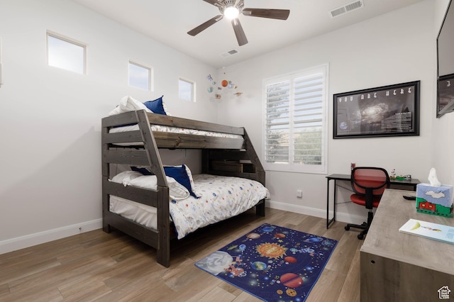 3318 S Red Rock Way, Hurricane, UT 84737 - bedroom with baseboards, visible vents, and wood finished floors