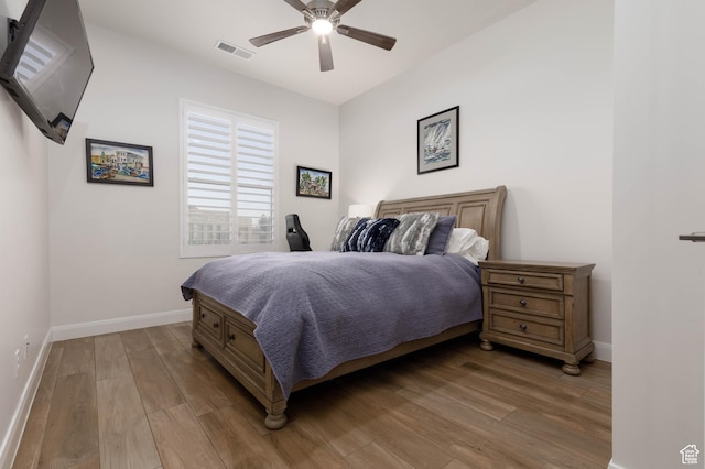 3318 S Red Rock Way, Hurricane, UT 84737 - bedroom with baseboards, ceiling fan, visible vents, and light wood-type flooring