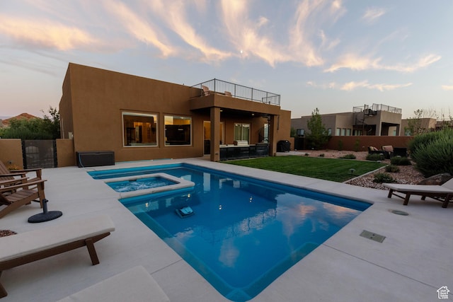 3318 S Red Rock Way, Hurricane, UT 84737 - view of swimming pool featuring an in ground hot tub, a patio area, a fenced in pool, fence, and a lawn