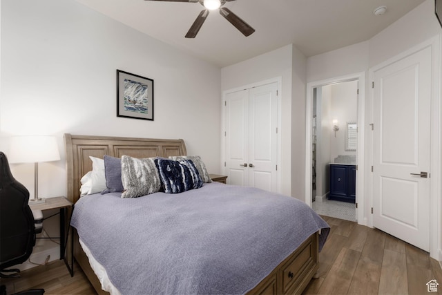 3318 S Red Rock Way, Hurricane, UT 84737 - bedroom featuring a ceiling fan, ensuite bath, a closet, and wood finished floors