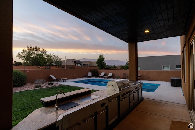3318 S Red Rock Way, Hurricane, UT 84737 - view of pool with a fenced backyard, area for grilling, a yard, and a patio