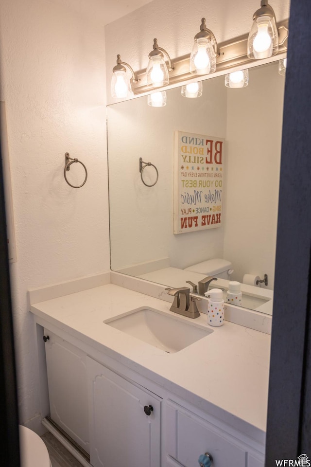 4424 W Skye Dr, South Jordan, UT 84009 - half bathroom with vanity and toilet