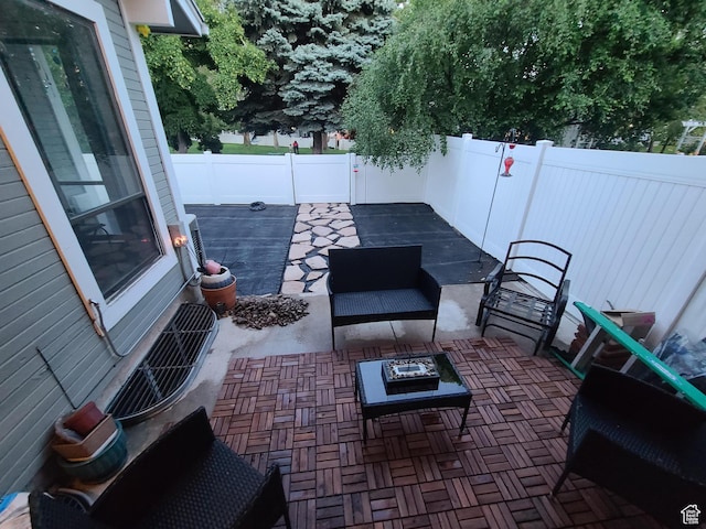 4424 W Skye Dr, South Jordan, UT 84009 - view of patio / terrace with an outdoor living space and a fenced backyard