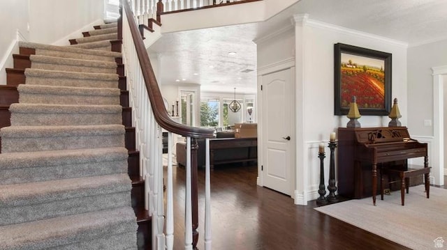 643 W Ridgewood Cir, Farmington, UT 84025 - stairs featuring crown molding and wood finished floors
