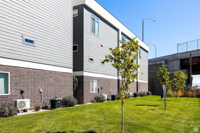 668 S 400 E, Clearfield, UT 84015 - view of property featuring central air condition unit and a cooling unit
