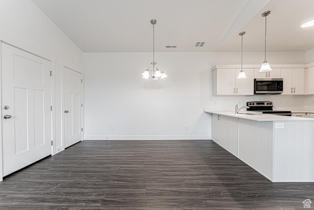 4718 W Neill Ln Unit Mm303, Riverton, UT 84096 - kitchen featuring light countertops, stainless steel appliances, and visible vents