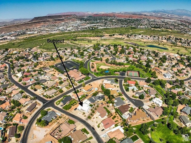 bird's eye view featuring a mountain view and a residential view