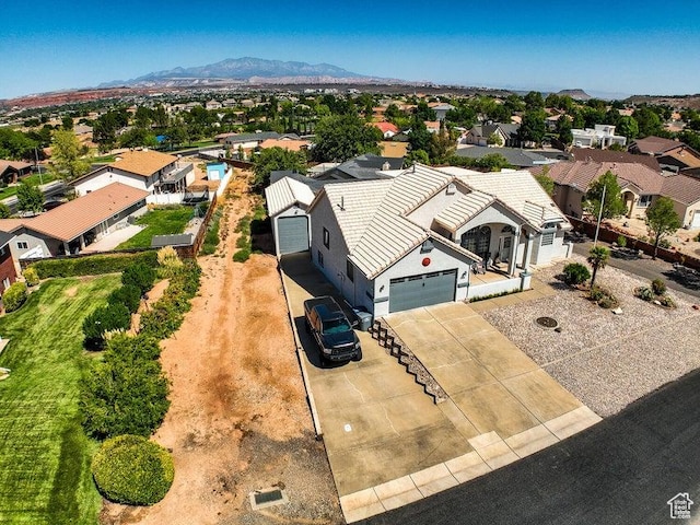 aerial view featuring a residential view and a mountain view