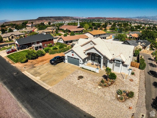 aerial view featuring a residential view and a mountain view