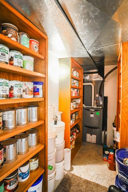 utility room with heating unit