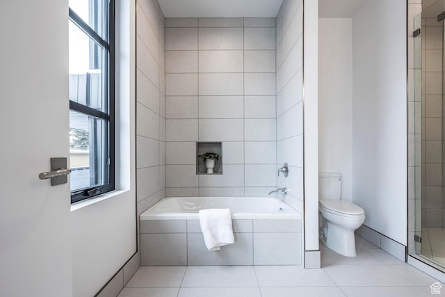 656 N E Capitol St, Salt Lake City, UT 84103 - bathroom with healthy amount of natural light, tiled tub, tiled shower, and tile patterned flooring