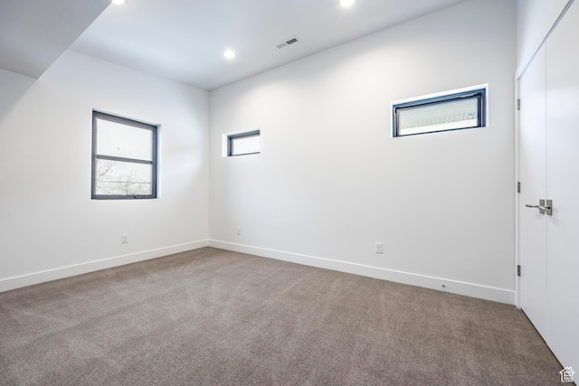 656 N E Capitol St, Salt Lake City, UT 84103 - carpeted empty room featuring recessed lighting and baseboards